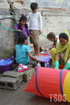 Fawad and Children at Water by Elizabeth Thayer, Fawad, and TSOS